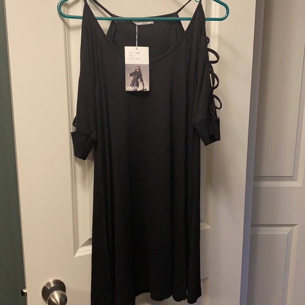 Black tunic with cut out arm detail
